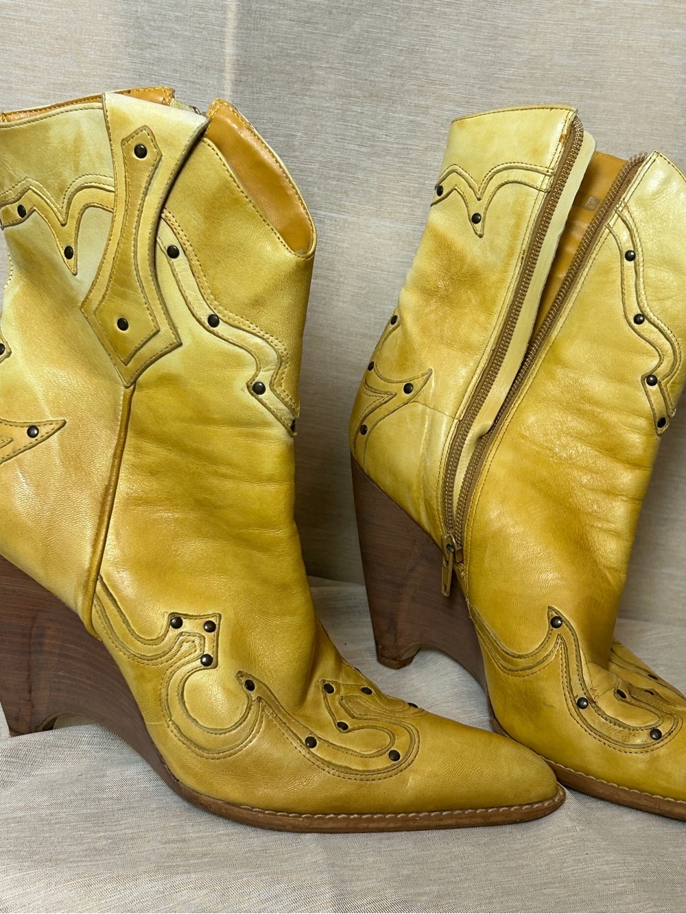BCBG Vintage Yellow Leather Western-Style Wedge Booties.
